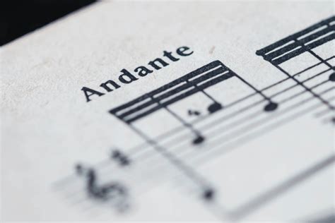 What Does Andante Mean in Music: A Multi-Layered Exploration